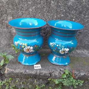 A Matching pair of Vintage small Czechoslovakian blue enamelware spittoons with over lay art work in a floral design 1920s enamel vases