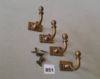 4 vintage style heavy cast brass Victorian design  coat hooks  in a AGED finish NOT lacquered or coated includes matching solid brass screws