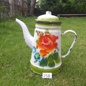 Vintage enamelware coffee pot with floral design 1950s