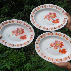 3 matching enamelware oval platters by Bumper harvest in bright 1950s enamel colors