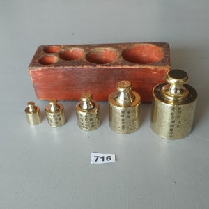 Early Vintage brass weights set with lots of date stamps with original red  box