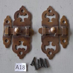 2 Vintage style aged heavy cast brass cabinet latches or door bolt lock NOT lacquered or coated includes FREE matching aged brass screws
