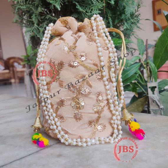 Bridal Velvet Embroidered Potli bags with pearl embellishments and