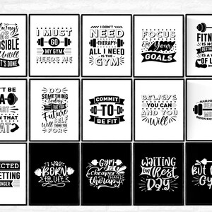 May include: A collection of framed motivational posters with black frames and white text on a black or white background. The posters feature fitness-related quotes and phrases, such as "I must go, my gym needs me."