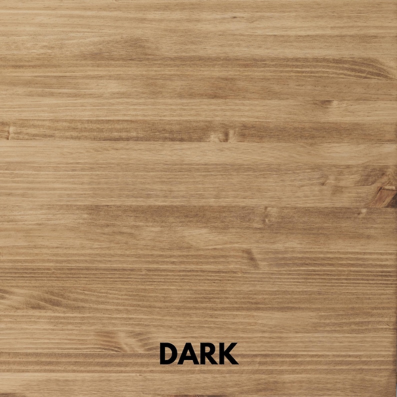 May include: Close-up of a wooden surface with a dark brown stain. The wood grain is visible, with horizontal lines and knots. The word "DARK" is printed in black at the bottom of the image.