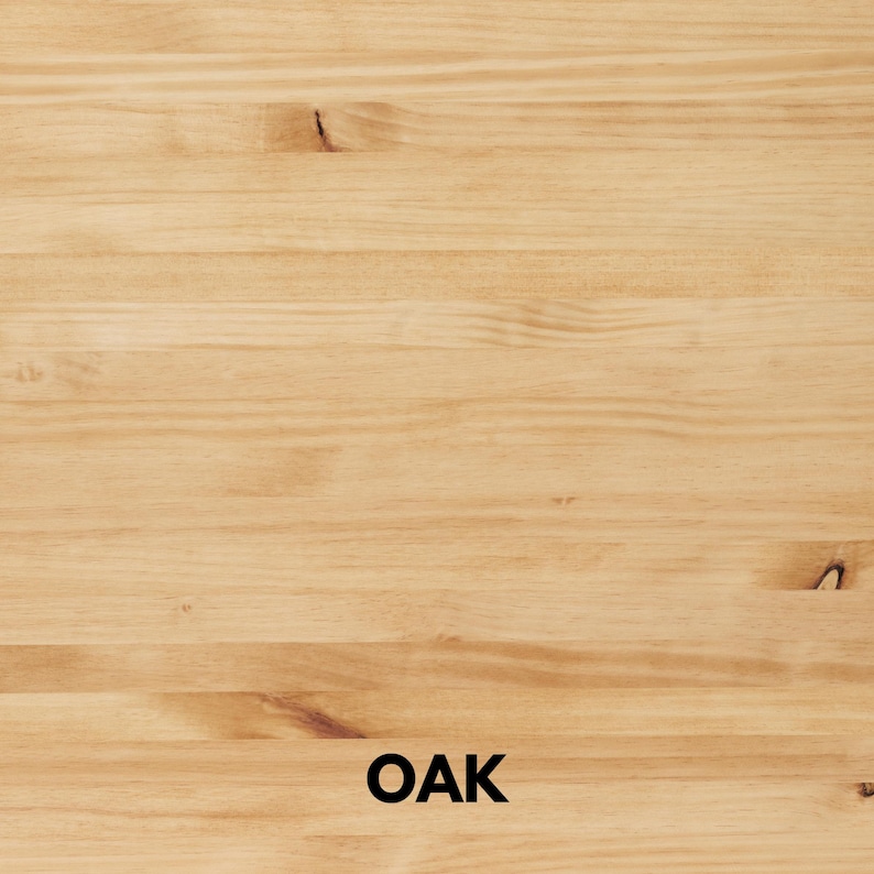 May include: Close-up of a light-colored oak wood surface. The wood grain is visible, with a mix of light and medium brown tones. The word "OAK" is printed in black at the bottom of the image.