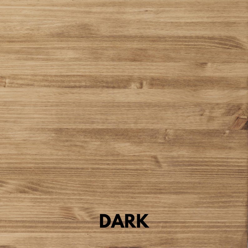 May include: A light brown wood surface with a visible natural grain pattern and horizontal texture. The word DARK is printed in bold black capital letters at the bottom center of the image, indicating the color finish of the wood material.