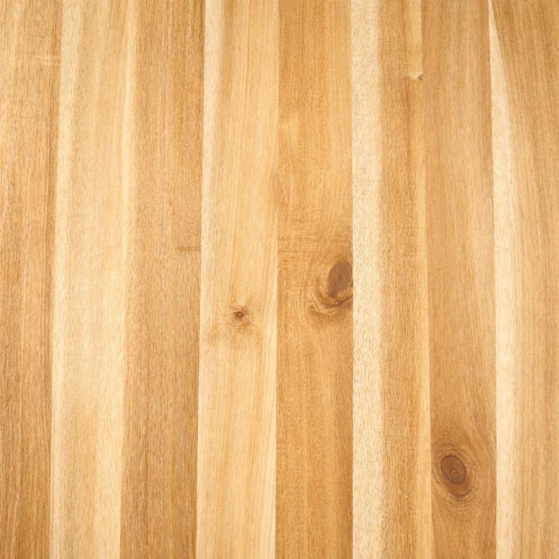May include: A light brown wooden surface featuring vertical planks joined together. The wood grain displays natural variations in colour, ranging from pale cream to warm tan, with visible knots and linear patterns running throughout the texture.