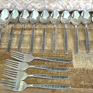 La Spana Daisychain Stainless Utensils, Set of 20 Pieces. c.1980's