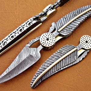 Damascus Leaf Folding Knife: 7.5&quot; Steel Bolster, Carbon Steel Handle