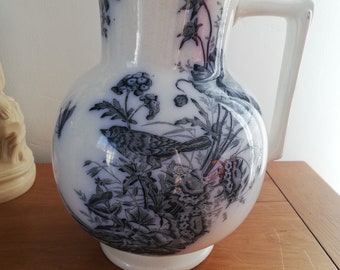 Ironstone pitcher royal manufacture of Nimy, Mouzin, Lecat and Co bird, butterfly transferware