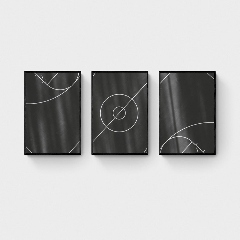 May include: Three black framed prints with white geometric designs on a white background. The designs are circles, lines, and arcs.