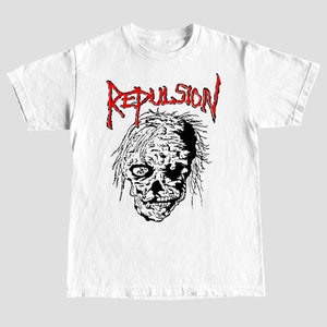 May include: White t-shirt with a black and white illustration of a zombie face and the word "REPULSION" in red letters.