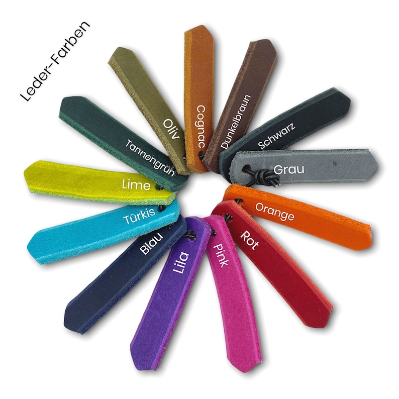 May include: Leather color chart with 14 different colors, including cognac, lime, turquoise, blue, pink, and red. The chart is labeled "Leder-Farben" in German.
