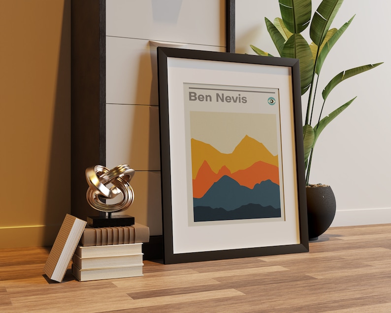 May include: A black framed print with the text "Ben Nevis" and a stylized mountain landscape in shades of orange, yellow, blue, and brown.