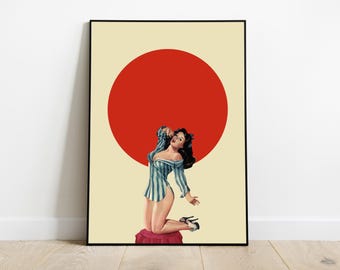 Puede incluir: Una lámina de arte mural enmarcada con una ilustración pin-up de una persona de pelo oscuro arrodillada sobre un cojín circular rojo. La persona lleva una camisa de botones a rayas azules y blancas y tacones altos sobre un fondo crema con un círculo rojo.