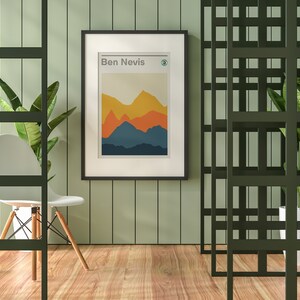 May include: A framed print with a minimalist mountain landscape design in shades of blue, orange, and yellow. The print is titled "Ben Nevis" and features a small circle with a number 3 inside.