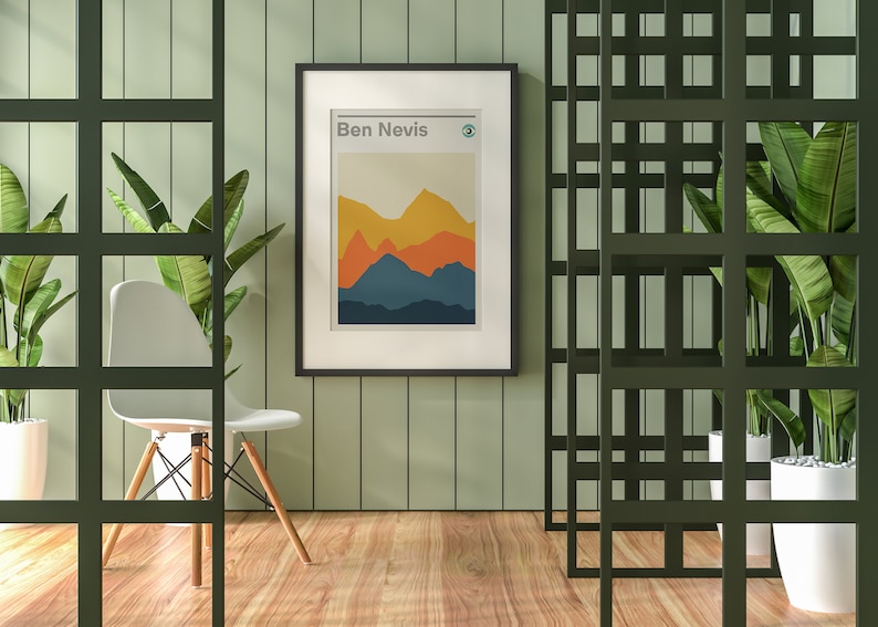 May include: A framed print with a minimalist mountain landscape design in shades of blue, orange, and yellow. The print is titled "Ben Nevis" and features a small circle with a number 3 inside.