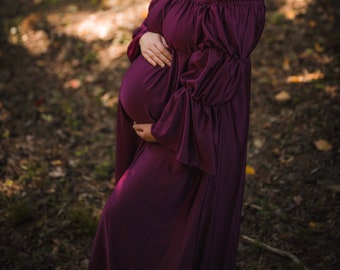 Maternity gown/dress with gathered sleeves and ruffle detailing on top.