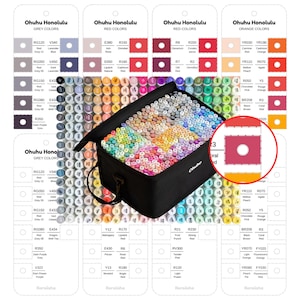 Peut inclure: Un étui noir rempli d'un grand ensemble de marqueurs Ohuhu Honolulu. Les marqueurs sont classés par couleur, avec des nuanciers et des noms affichés sur des cartes. Les marqueurs sont destinés à l'art et au design.