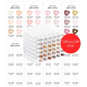 May include: A clear acrylic organizer filled with numerous markers, positioned in front of two white reference charts labeled Ohuhu Oahu skin colors. The charts display various color swatches with corresponding codes, and a red circle features the text New & Old Code.