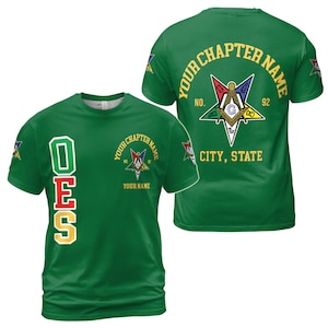 May include: Green t-shirt with the letters "OES" on the left side and "YOUR CHAPTER NAME" on the right side. The back of the shirt has a five-pointed star with a compass and square in the center. The text "YOUR CHAPTER NAME", "NO. 92", and "CITY, STATE" is printed on the back of the shirt.
