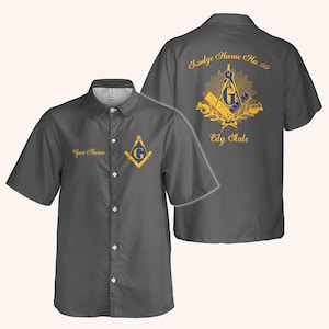 May include: Charcoal gray short-sleeve button-up shirt with Masonic emblem on the front and back. The front features the text "Your Name" and a gold and blue square and compass design. The back displays "Lodge Name No. 99" and "City State" in gold.