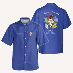 Puede incluir: Camisa azul real con botones y mangas cortas. La parte delantera presenta un emblema de estrella y el texto "Your Name". La parte trasera muestra "Chapter No. 99" con diseños florales y de estrella, y "PHA City, State."