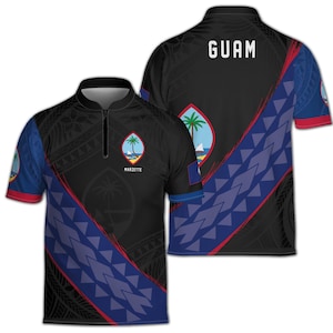 May include: A black polo shirt with a quarter-zip collar, featuring the Guam flag emblem, the text MARZETTE, and the word GUAM on the back. The design includes blue and red diagonal geometric patterns and subtle tribal-inspired floral motifs.