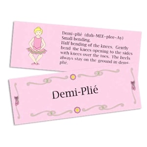 May include: Two rectangular pink cards featuring ballet terminology. One card shows a cartoon dancer in a pink tutu with the text Demi-plié (duh-MEE-plee-Ay) Small bending. Half bending of the knees. The other card displays the text Demi-Plié.