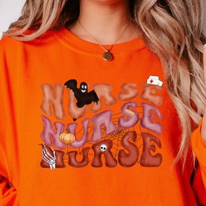 Krankenschwester Halloween Shirt, Sweatshirt, Hoodie, Langarm, Geschenk, Sand, Herbstbekleidung, rn, bsn, Krankenschwester, Notfallschwester