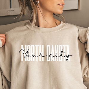 Personalized North Dakota shirt, sweatshirt, hoodie, long sleeve, gift, custom city North Dakota, ND, Fargo, Bismarck, Grand Forks