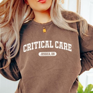 Personalized Critical Care Comfort Colors shirt, sweatshirt, hoodie, long sleeve, tank top, youth tee gift, intensive care nurse ccu