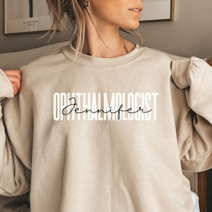 Personalized Ophthalmologist shirt, sweatshirt, hoodie, long sleeve, gift, custom name Ophthalmology tech, optometry technician, optometrist
