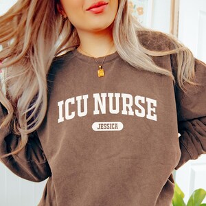 Personalized ICU Nurse Comfort Colors shirt, sweatshirt, hoodie, long sleeve, tank top, youth tee gift, intensive care nurse, critical care