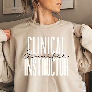 Personalized Clinical Instructor shirt, sweatshirt, hoodie, long sleeve, gift, custom name Clinical Nursing Instructor, nurse educator