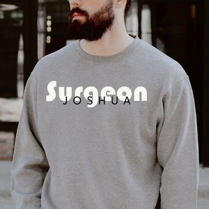Personalized Surgeon shirt, sweatshirt, hoodie, long sleeve, gift, custom name Surgeon, surgical tech, med surg, doctor
