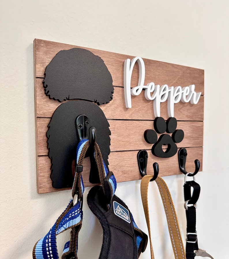 A custom dog name wooden sign leash holder.