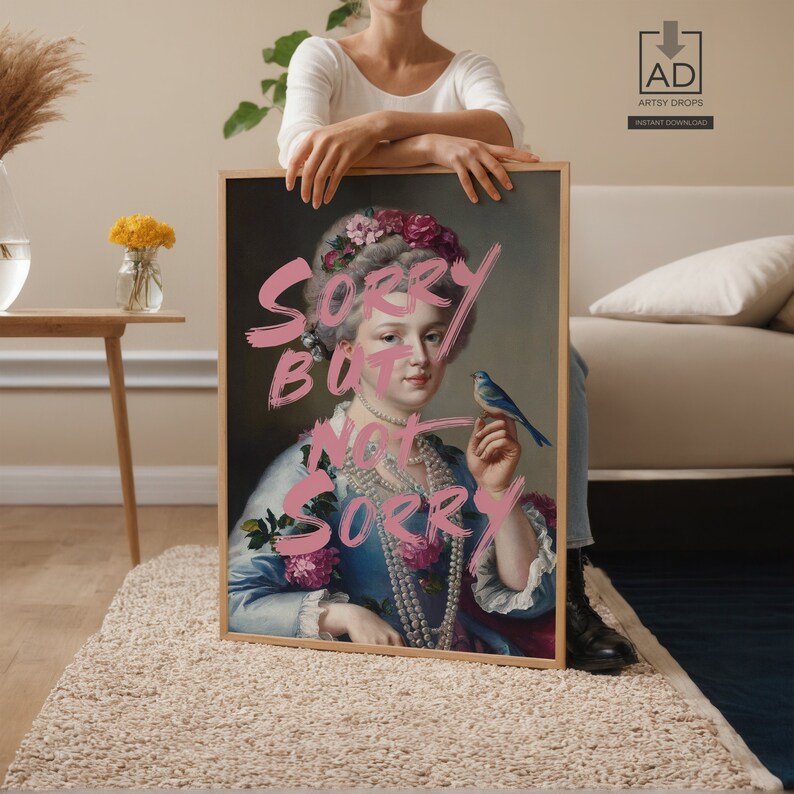 a woman holding a sign with a picture of a woman holding a bird