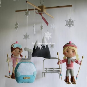 baby mobile mountains baby pink girl skiing winter sports sky personalized kid&#39;s snowsuits made to order nursery mobile gondola ski lift
