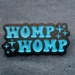 WOMP WOMP enamel pin 1.5 inch by 0.5 inch