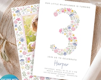 May include: A white birthday invitation card featuring a large number three formed by colorful floral illustrations. The text reads: OUR LITTLE WILDFLOWER IS TURNING, JOIN US TO CELEBRATE, Harper, SATURDAY, APRIL 18 TH AT 2 PM, MAGIC GARDEN PLAYHOUSE, 125 RAINBOW AVENUE, BROOKLYN, NY 11211.