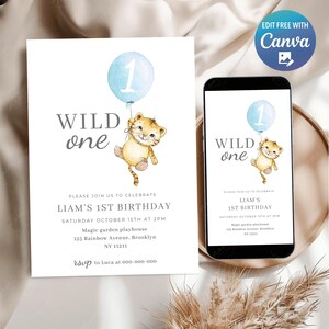 Può includere: Un invito di compleanno con la scritta "WILD one" e un'illustrazione ad acquerello di un cucciolo di tigre che tiene in mano un palloncino blu con il numero 1. L'invito include i dettagli della festa e un numero di telefono.