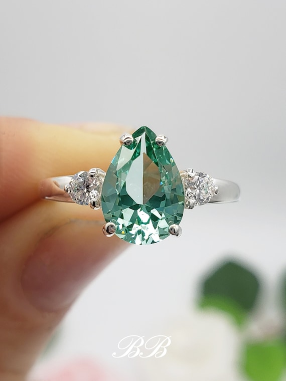 Sterling Silver Created Green Spinel And CZ Halo Ring Sterling Silver Created Green Spinel And CZ Halo Ring