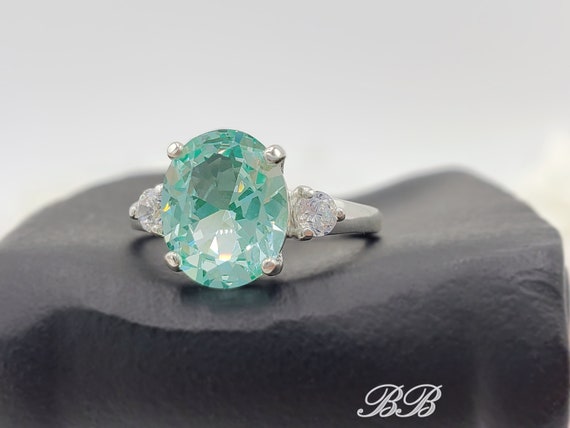 Sterling Silver Created Green Spinel And CZ Halo Ring Sterling Silver Created Green Spinel And CZ Halo Ring