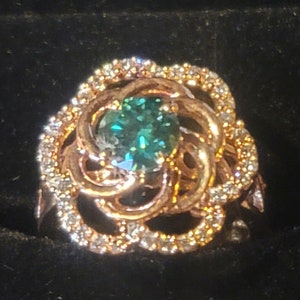 Blue Diamond .8-carat Solitaire in Rose Gold Love Knot Ring