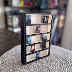 Bookshelf for miniature books...shaped like a book