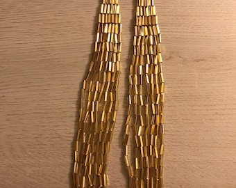 Pendientes de flecos de puntada de ladrillo con cuentas