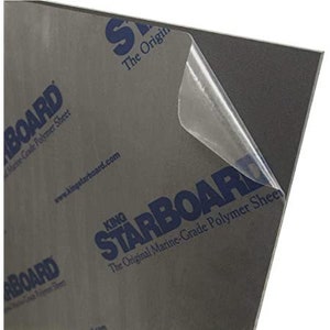 May include: A sheet of gray King Starboard marine-grade polymer sheet with a protective film covering part of the sheet. The text "KING STARBOARD The Original Marine-Grade Polymer Sheet" is printed on the sheet.
