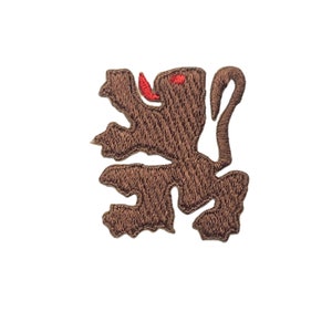 May include: Brown embroidered lion patch with a red tongue.